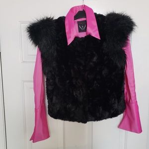 A pick shirt with  fury vest connected